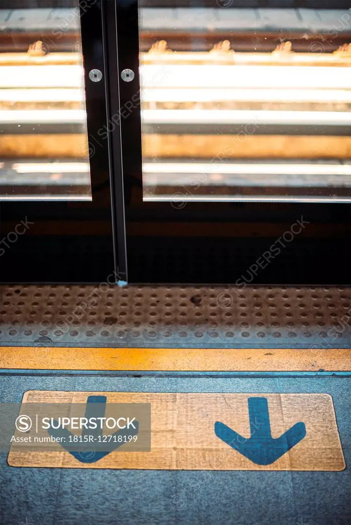 Thailand, Bangkok, Arrow signs at florr of skytrain