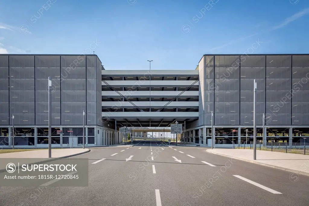 Germany, Berlin Brandenburg Airport, car park and empty road