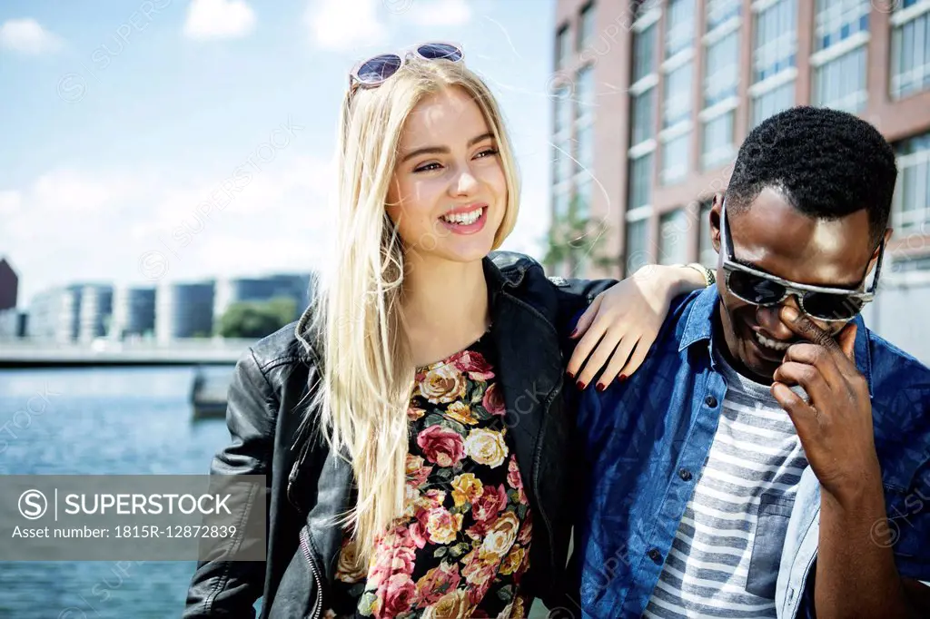 Germany, Duisburg, laughing young couple at Media Harbour