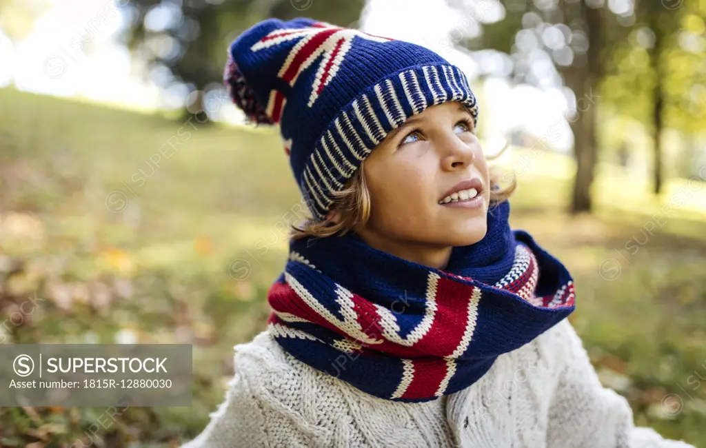 Portrait of blond boy wearing fashionable knit wear in autumn