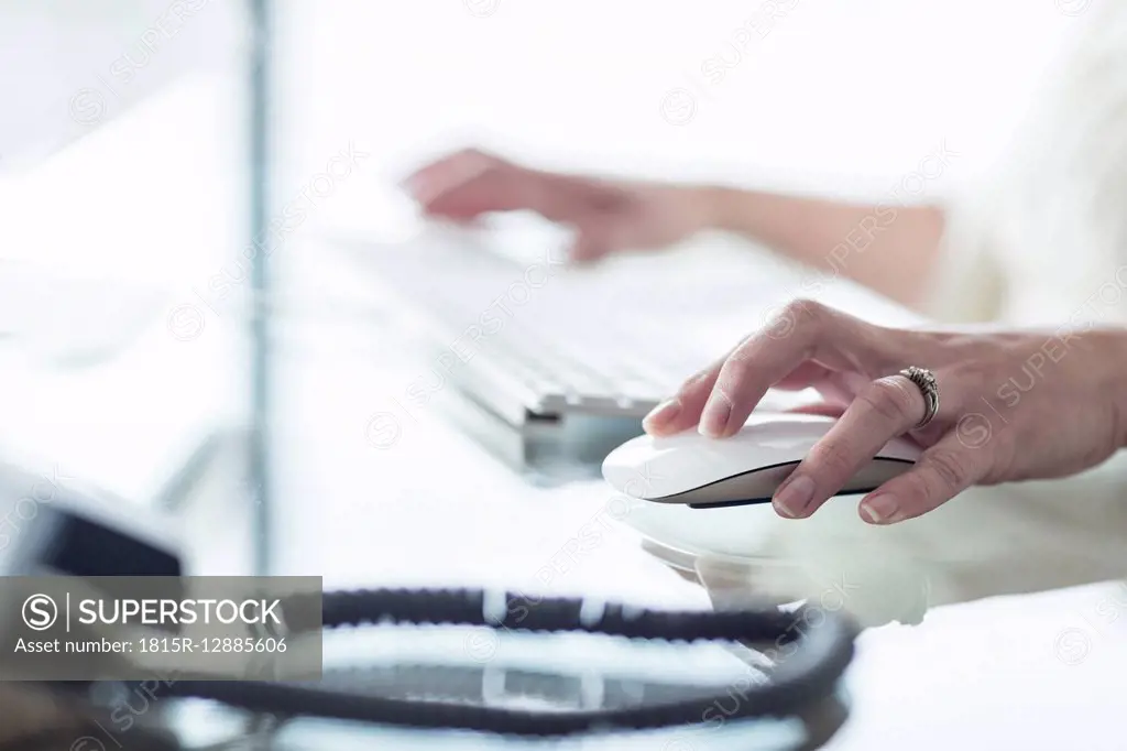 Close-up of woman working on computer