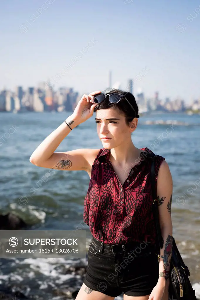 USA, New York City, Brooklyn, portrait of tattooed young woman
