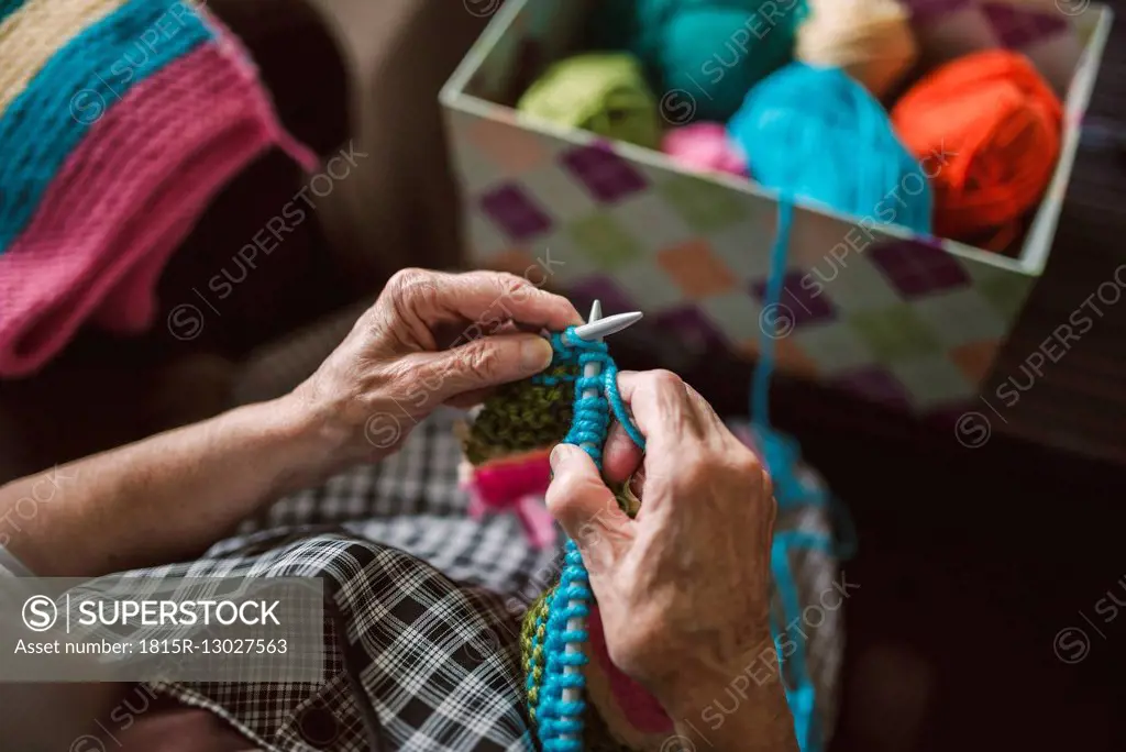 Hands of knitting senior woman, close-up