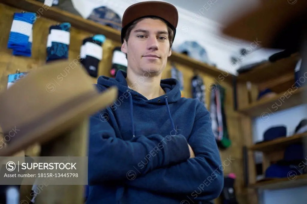 Salesperson in skater shop