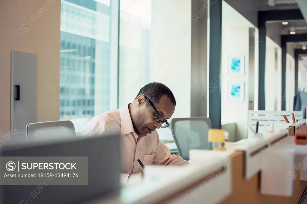 Businessman working alone in office