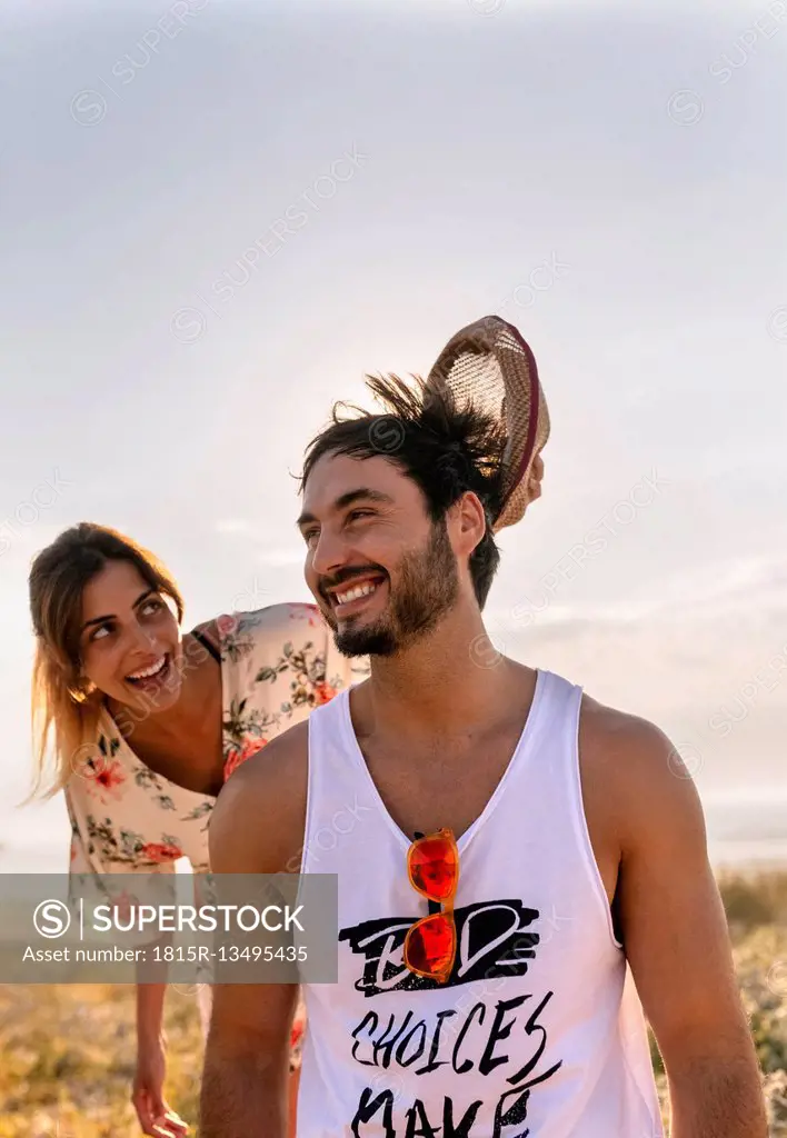 Couple having fun together near the coast