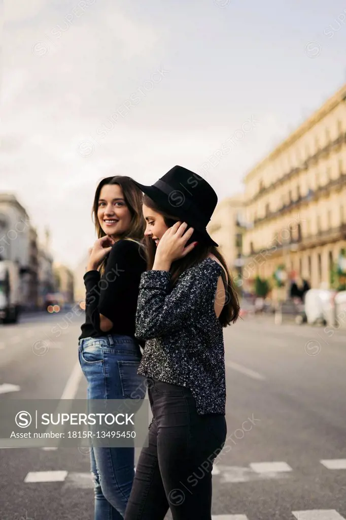 Two best friends crossing street