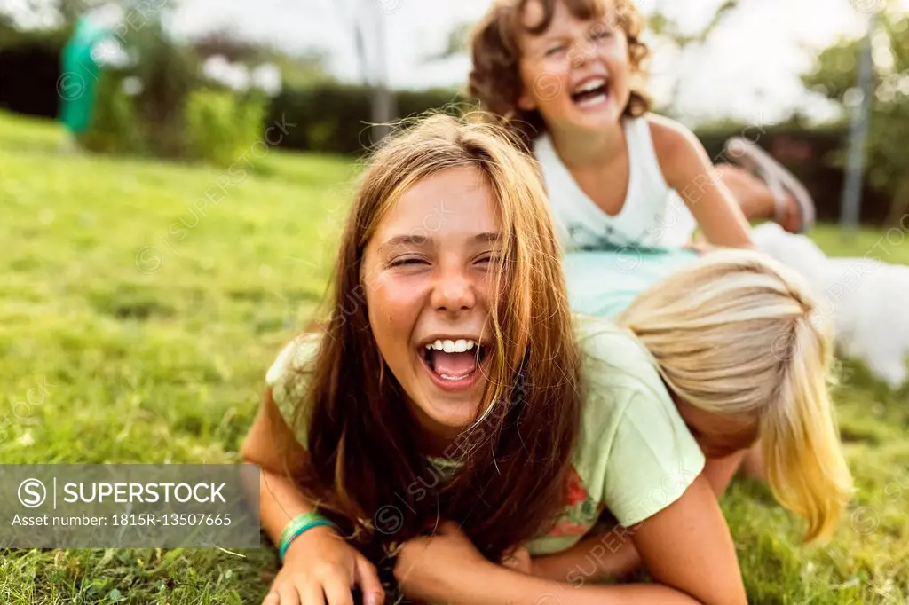 Girls having fun together on a meadow