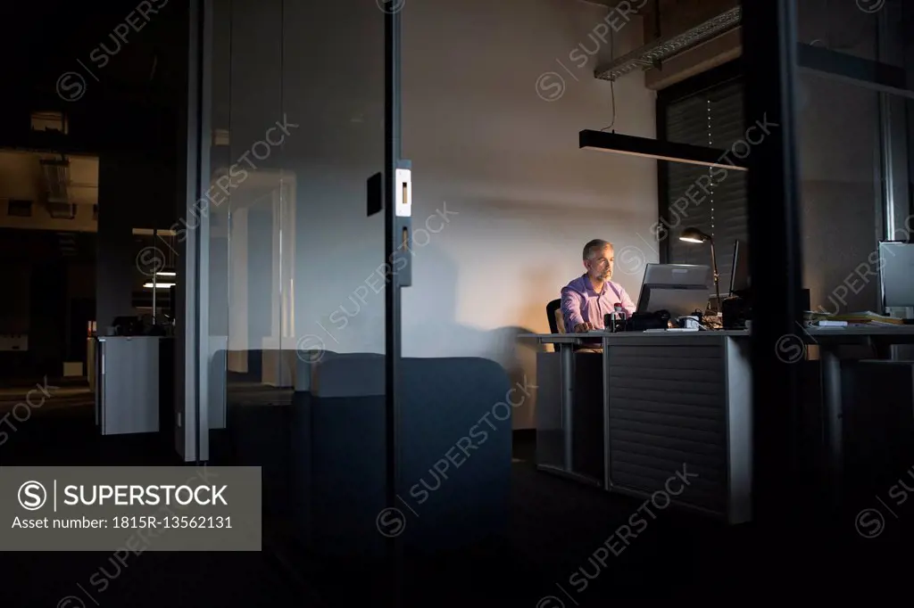 Businessman working late in office