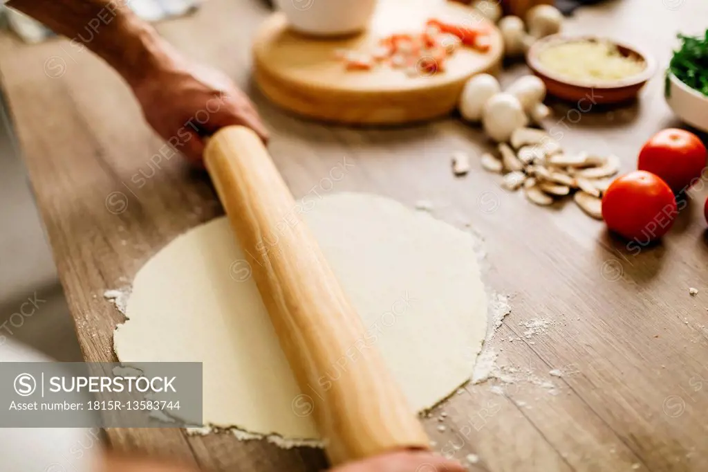 Man preparing pizza