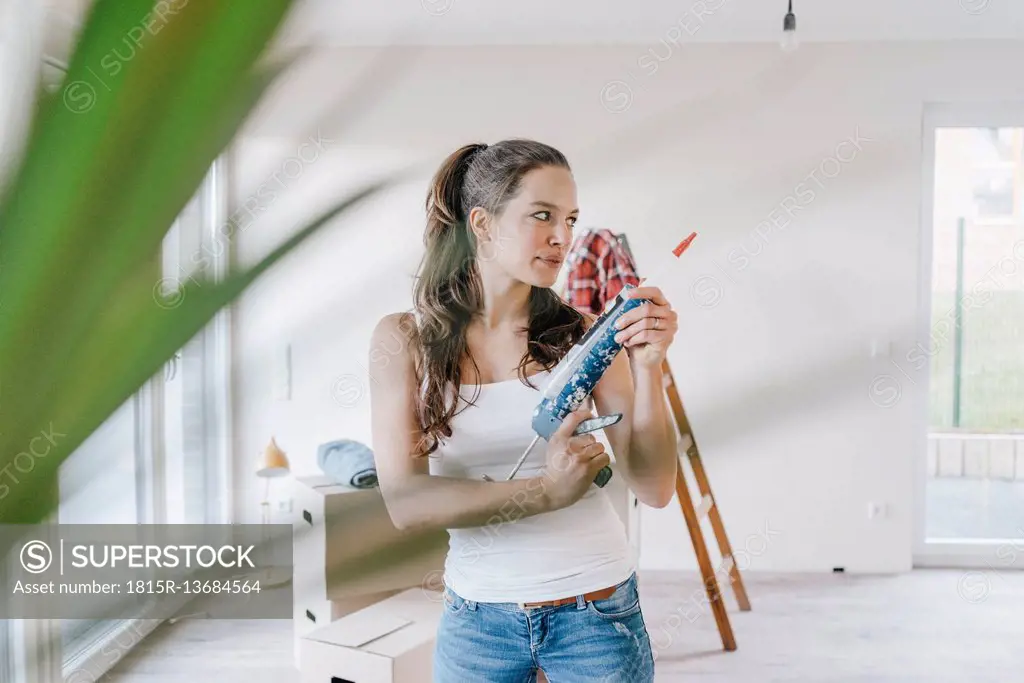 Woman Knead Glue Wallpapering Pouring Wallpaper Stock Photo