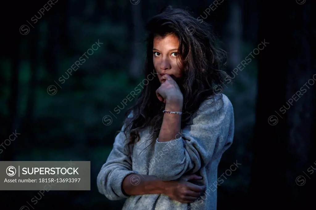 Portrait of young woman in the woods