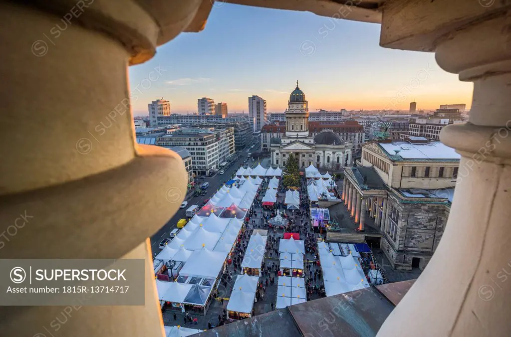 Germany, Berlin, Christmas market at Gendarmenmarkt at dusk