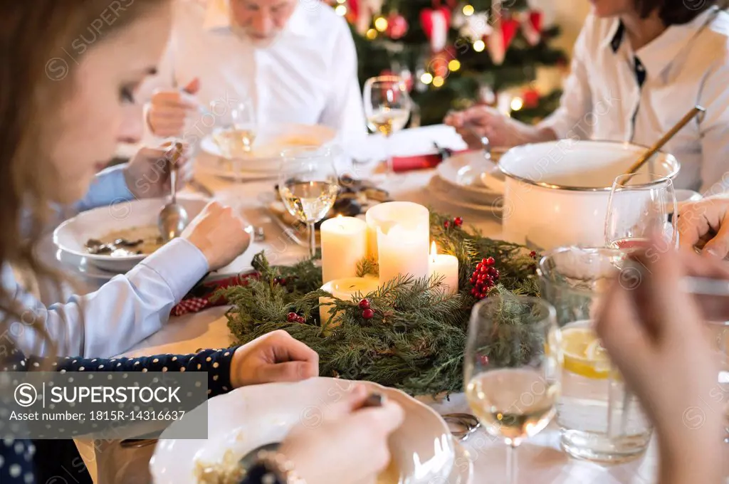 Family dining at Christmas dinner table