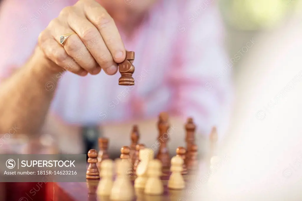 Close-up of senior couple playing chess