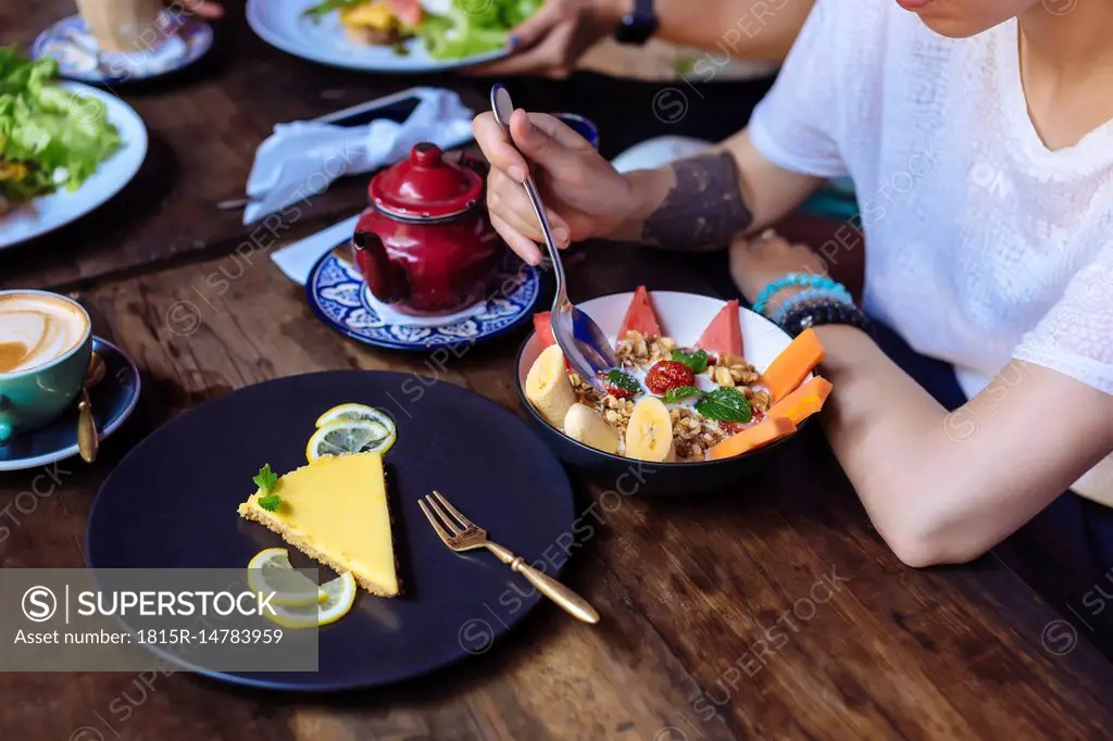 Woman having a healthy meal in a cafe