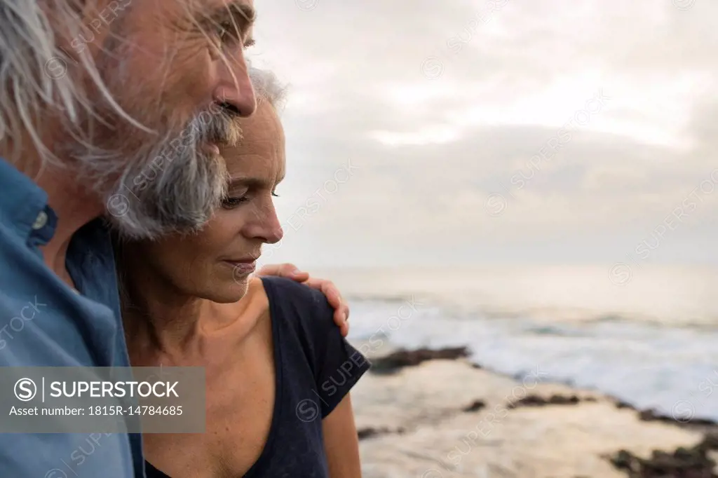 Portrait of a handsome senior couple at the sea