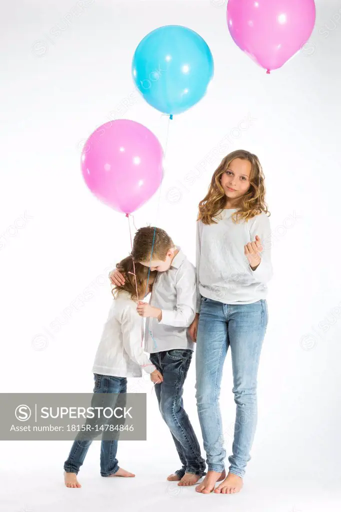 Children playing with balloons