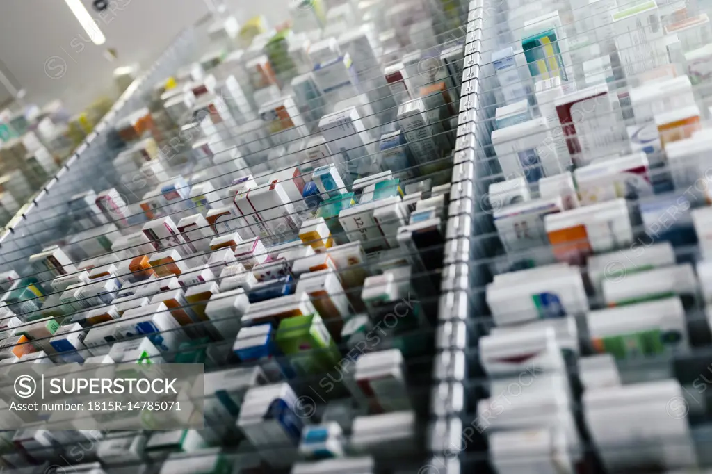 Medicine in shelves in commissioning machine in pharmacy