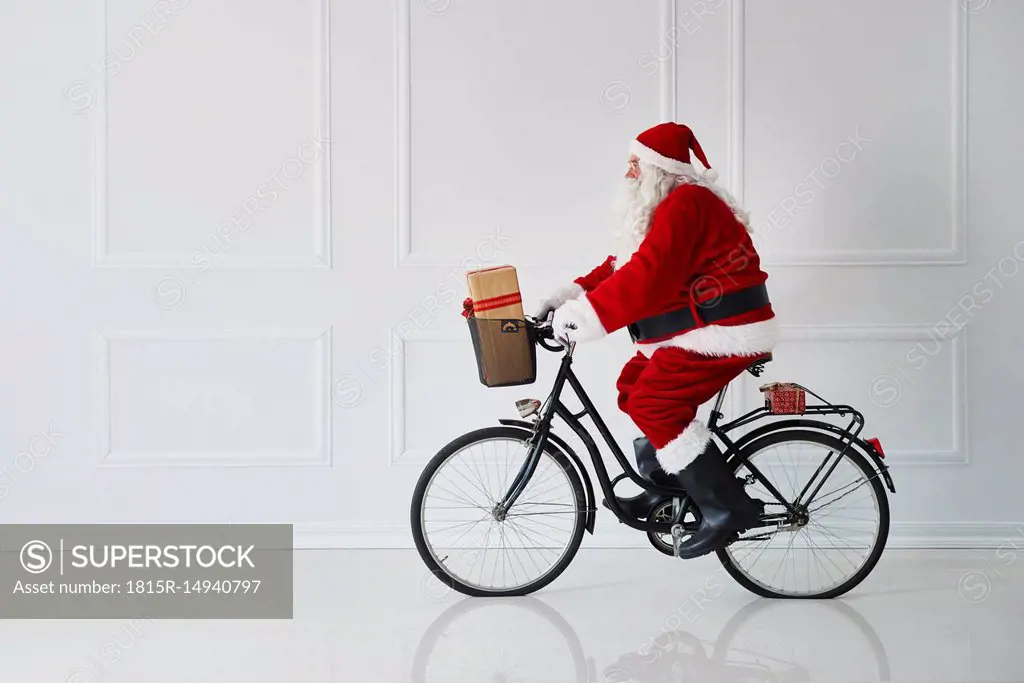 Santa Claus riding a bike