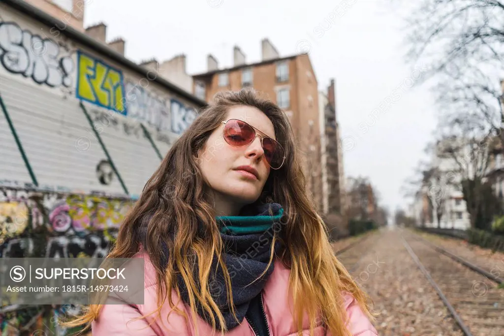 Portrait of young woman wearing sunglasses