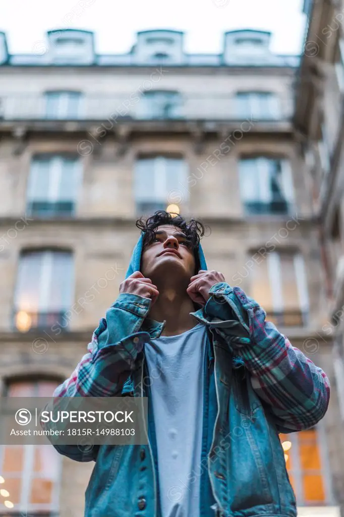 Young man looking up