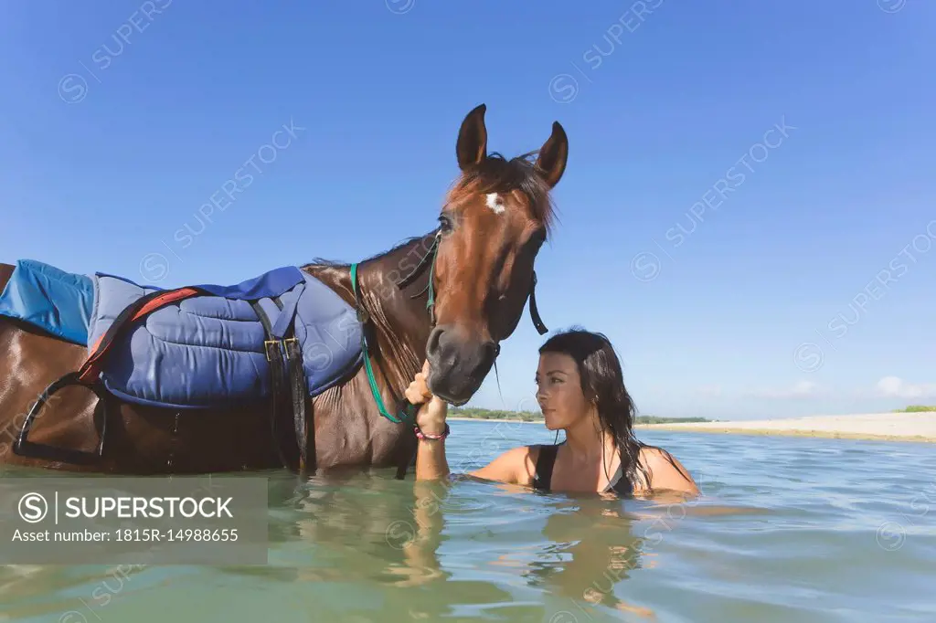 Indonesia, Bali, Woman with horse