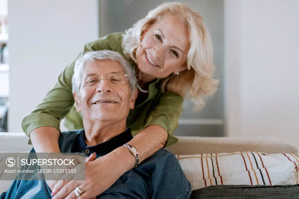 Portrait of affectionate senior couple at home