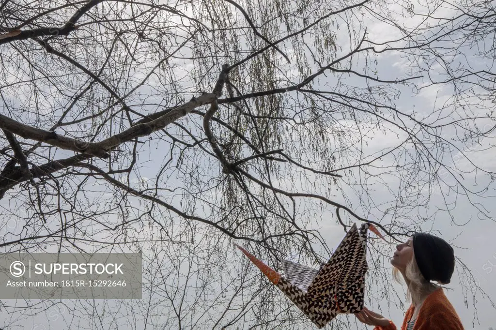 Origami crane and woman