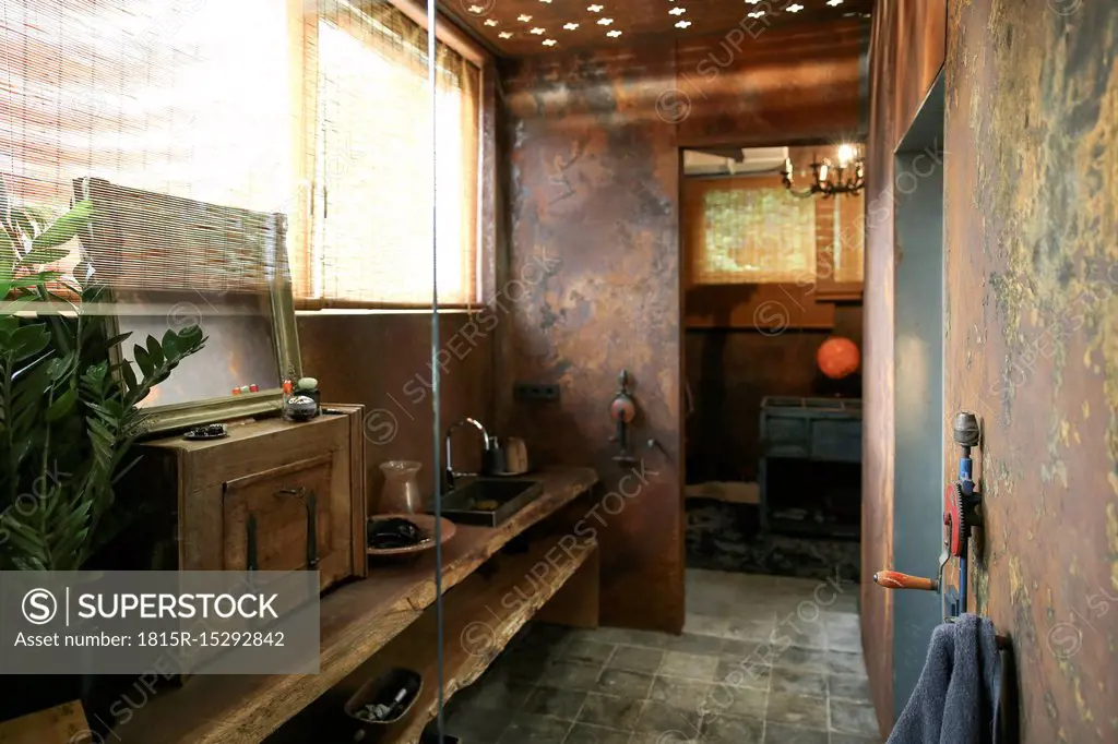 Bathroom with corten steel wall cladding