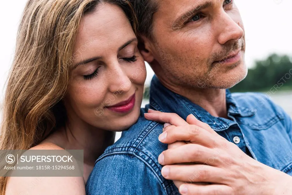 Close-up of affectionate couple outdoors