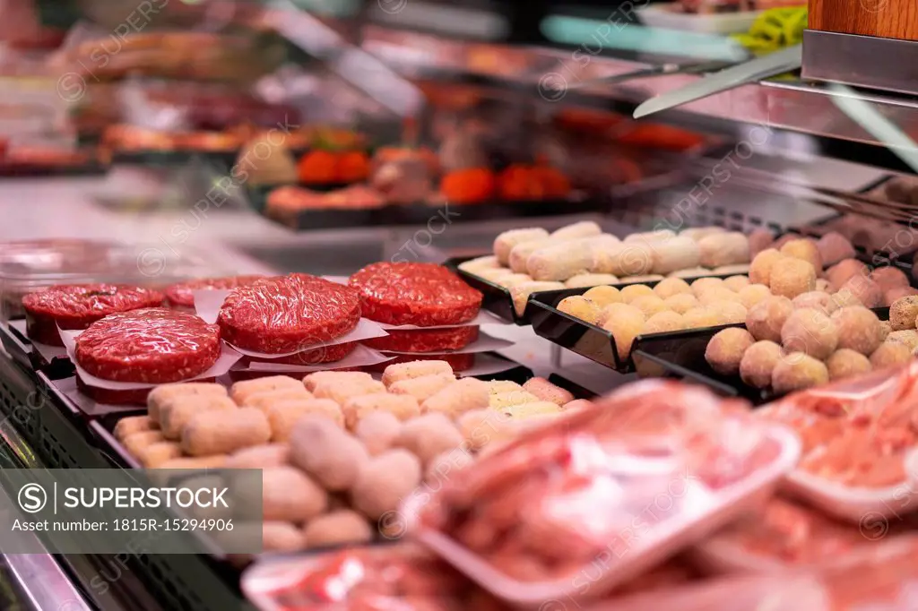 Meat products on display at a meat counter