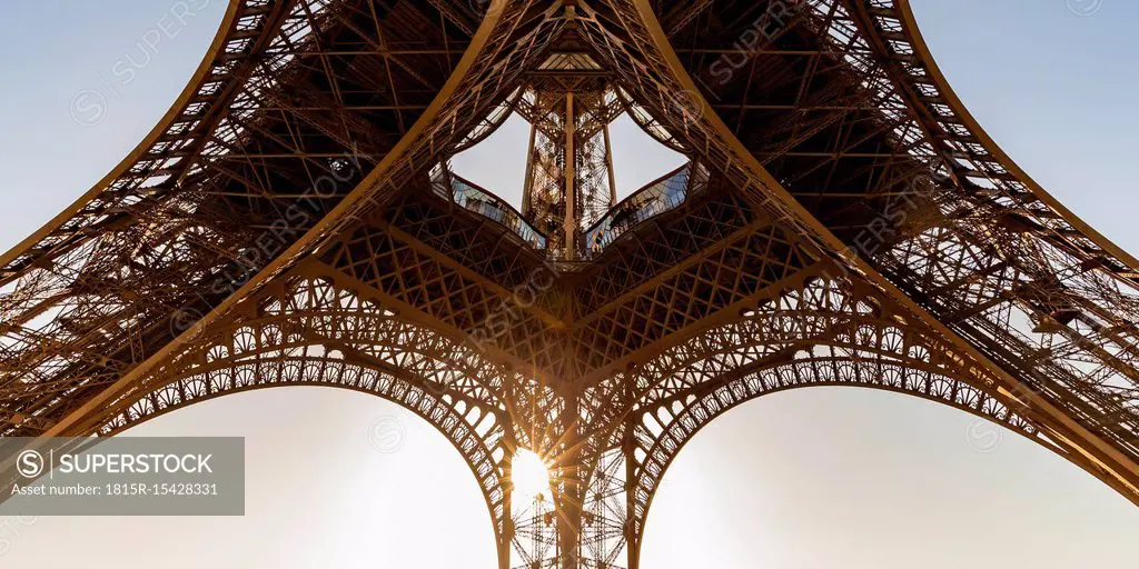 France, Paris, Eiffel Tower, worm's eye view at sunset