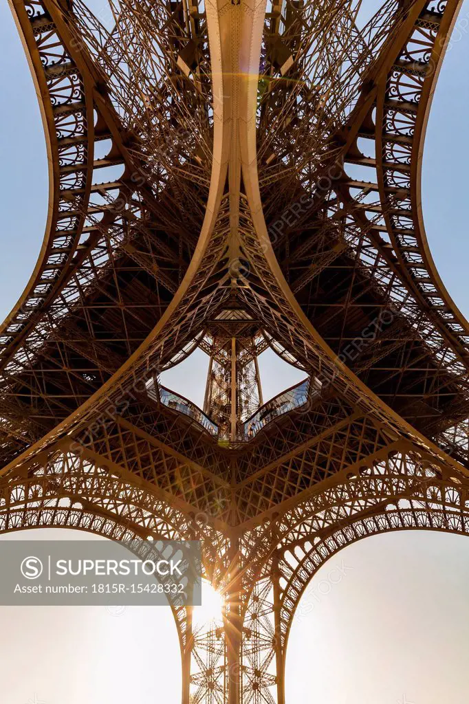 France, Paris, Eiffel Tower, worm's eye view at sunset