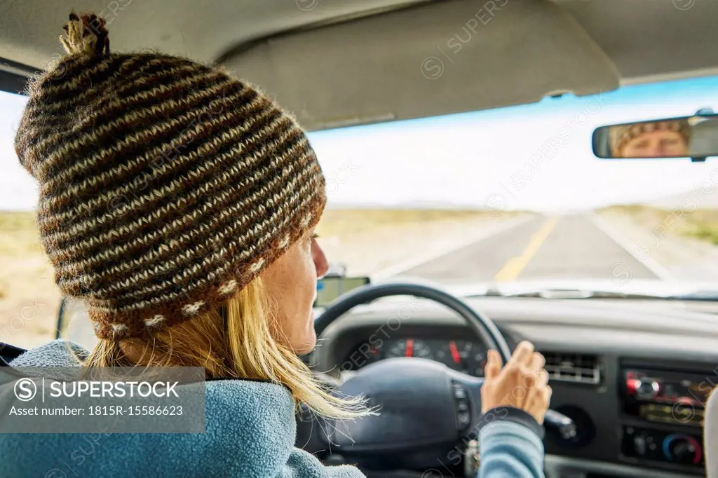 Peru, Arequipa, woman driving car on Panamericana