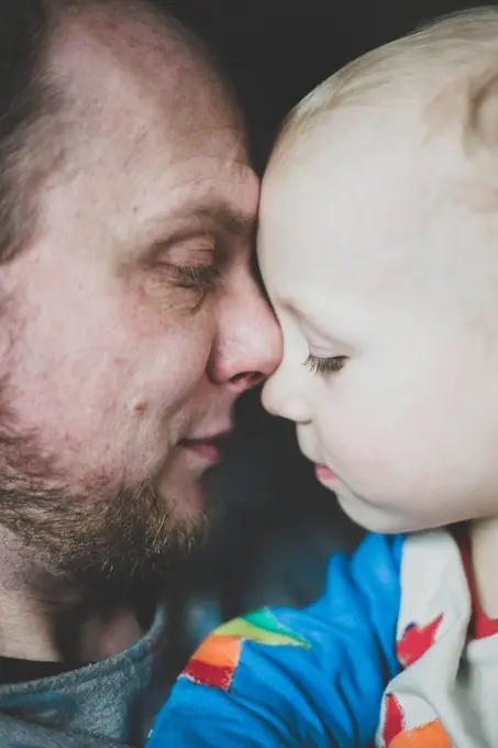 Close-up of father with little son