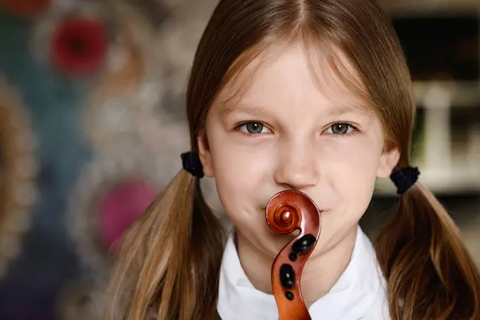 Portrait of a girl with a violin