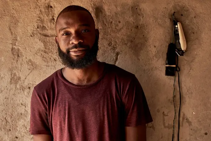 Mozambique, Maputo, portrait of bearded young man