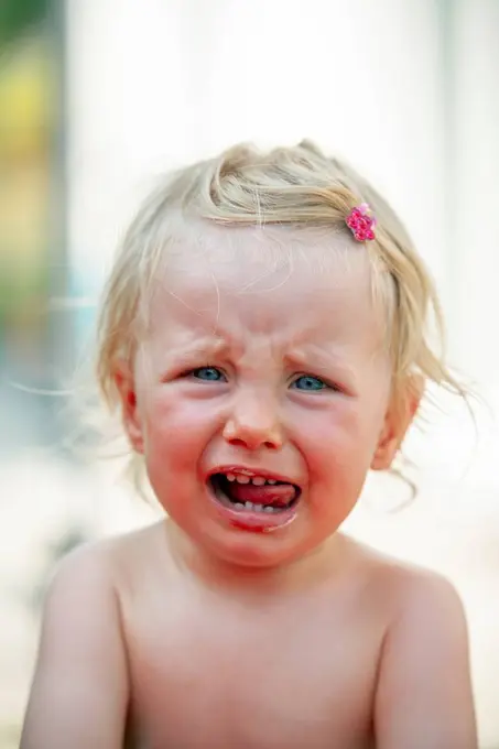 Portrait of crying little girl