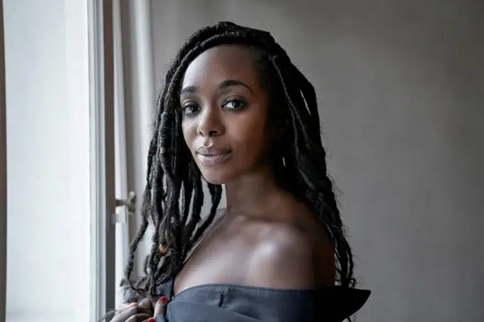 Portrait of woman with dreadlocks