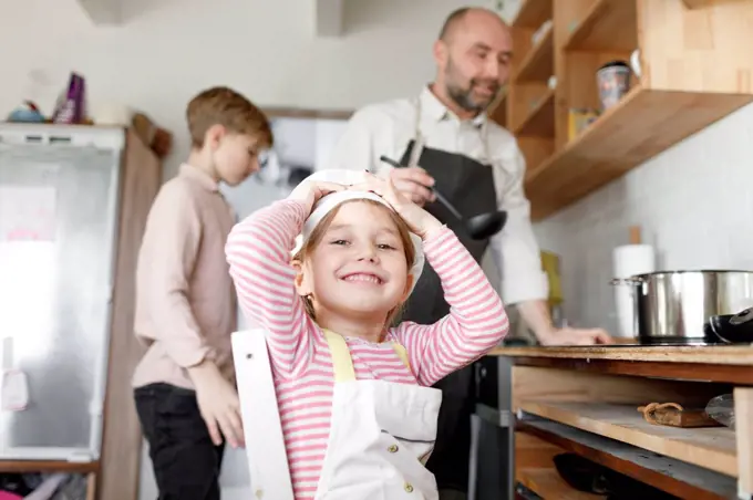 Family cooking in the kitchen