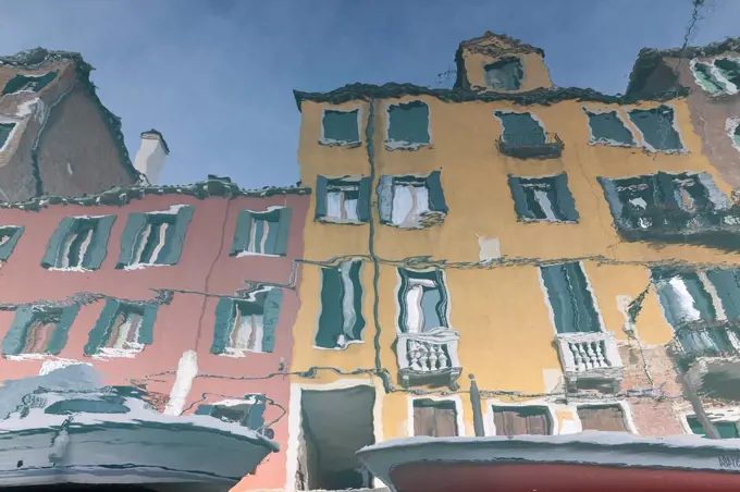 Italy, Venice, Houses reflecting in canal