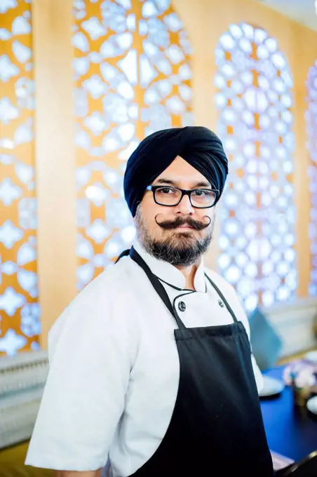 Portrait of Indian chef in restaurant