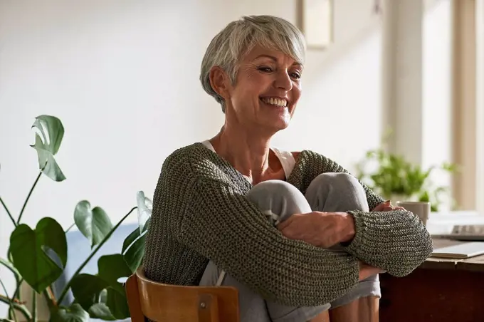 Portrait of senior woman relaxing at home