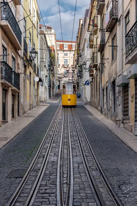 Portugal, Lisbon, Cable car driving along Ascensor da Bica railway line