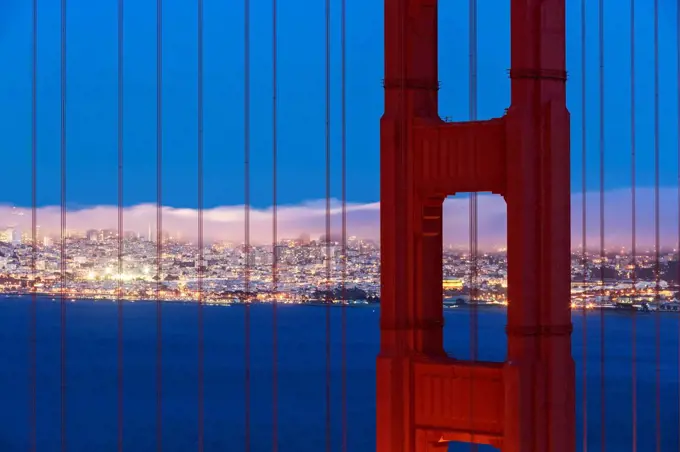 USA, California, San Francisco, skyline and Golden Gate Bridge at the blue hour seen from Hawk Hill