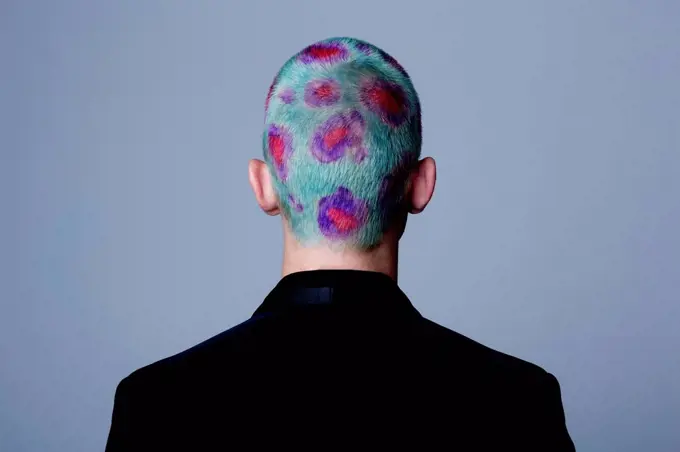 Young man with dyed shot hair studio