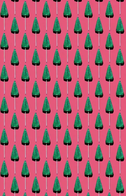 Pattern of¶ÿtree-shaped¶ÿlollipops against red background