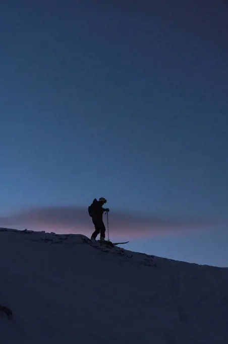 Mature man skiing during winter