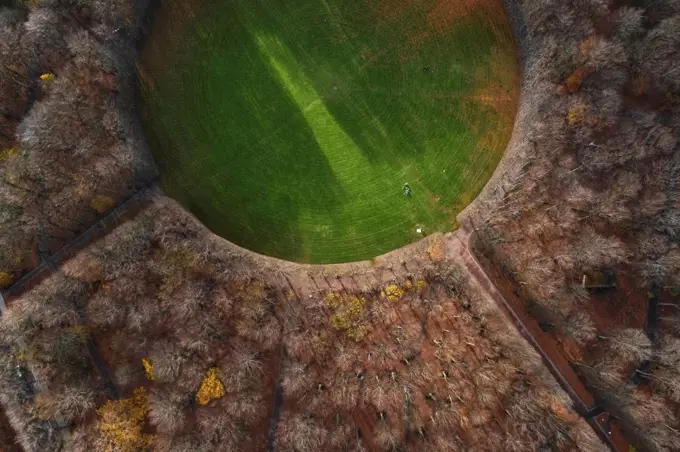 Sweden, Scania, Malmo, Aerial view of circular glade of Pildammsparken in autumn